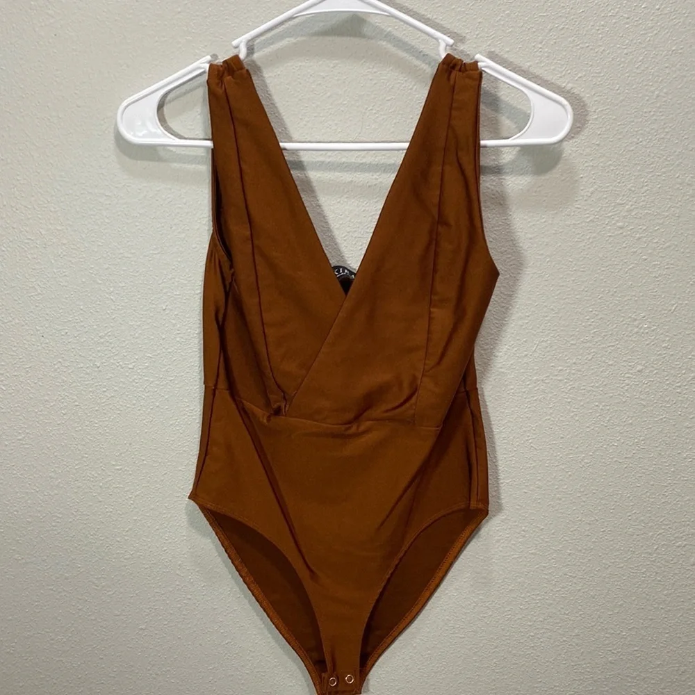 Akira‎ bodysuit rust orange color
